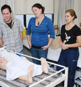 Tutor with nursing students at the CPIT clinical practice unit