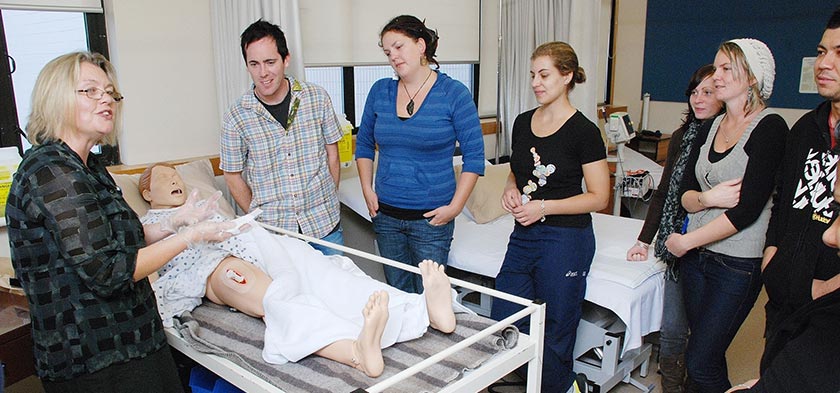 Tutor with nursing students at the CPIT clinical practice unit