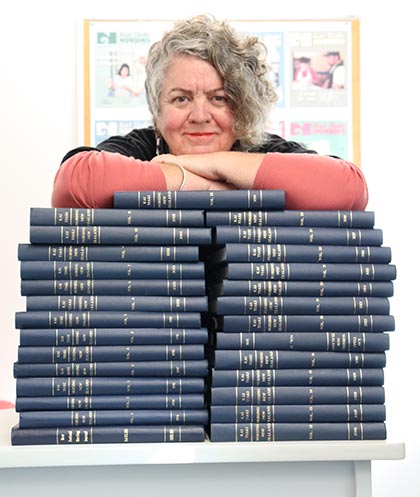 Outgoing co-editor Teresa O'Connor with 29 years' worth of Kai Tiaki Nursing New Zealand journals.