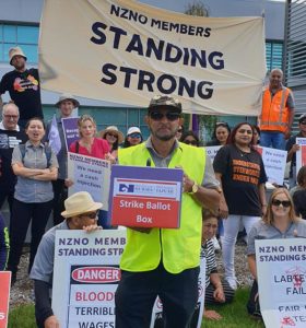 NZNO members picket outside Labtests head office in Mount Wellington, Auckland, last month.
