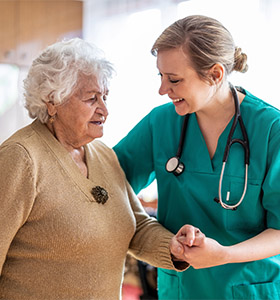 Nurse with elderly woman