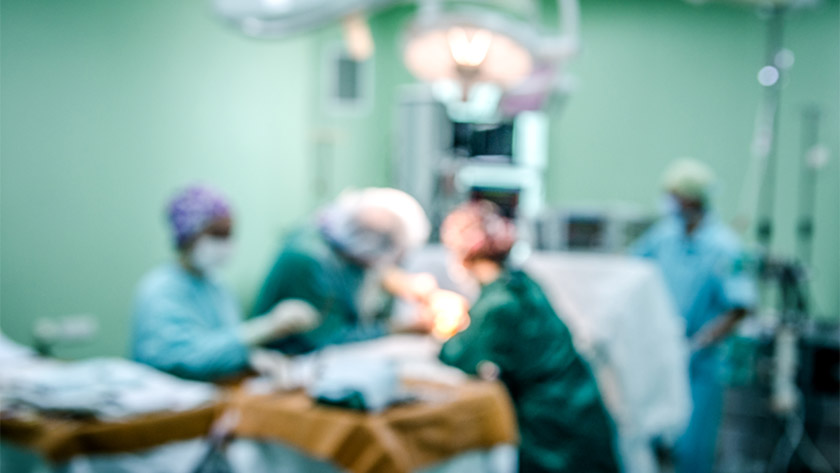Blurred image of an operating room during an operation.