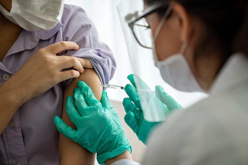Nurse injecting patient with vaccine. PHOTO: ADOBE STOCK