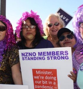 NZNO members on strike in Wellington - dressed in purple