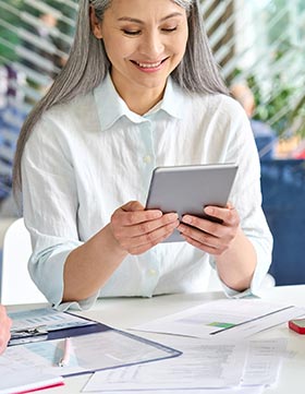 Woman with tablet. PHOTO:ADOBE STOCK