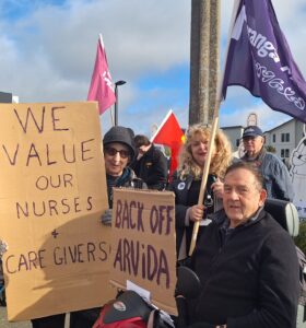 'We are caring for our staff' -- Wellington retirement village residents stand shoulder to shoulder with threatened nurses and caregivers.