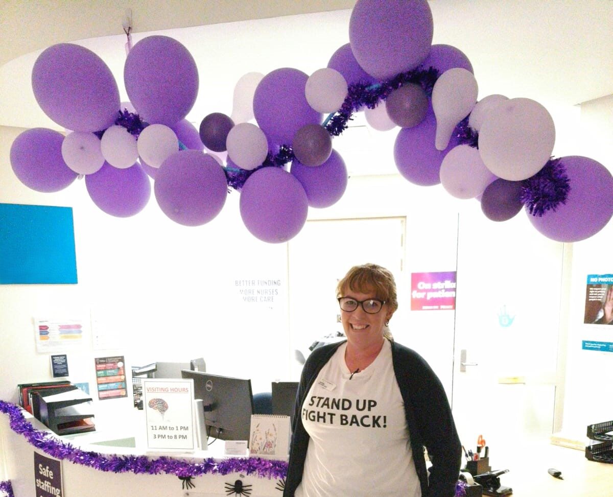 Cut-down cupcakes, cute dinosaurs . . .  nurses and kaiāwhina get creative for pay equity’s go purple day