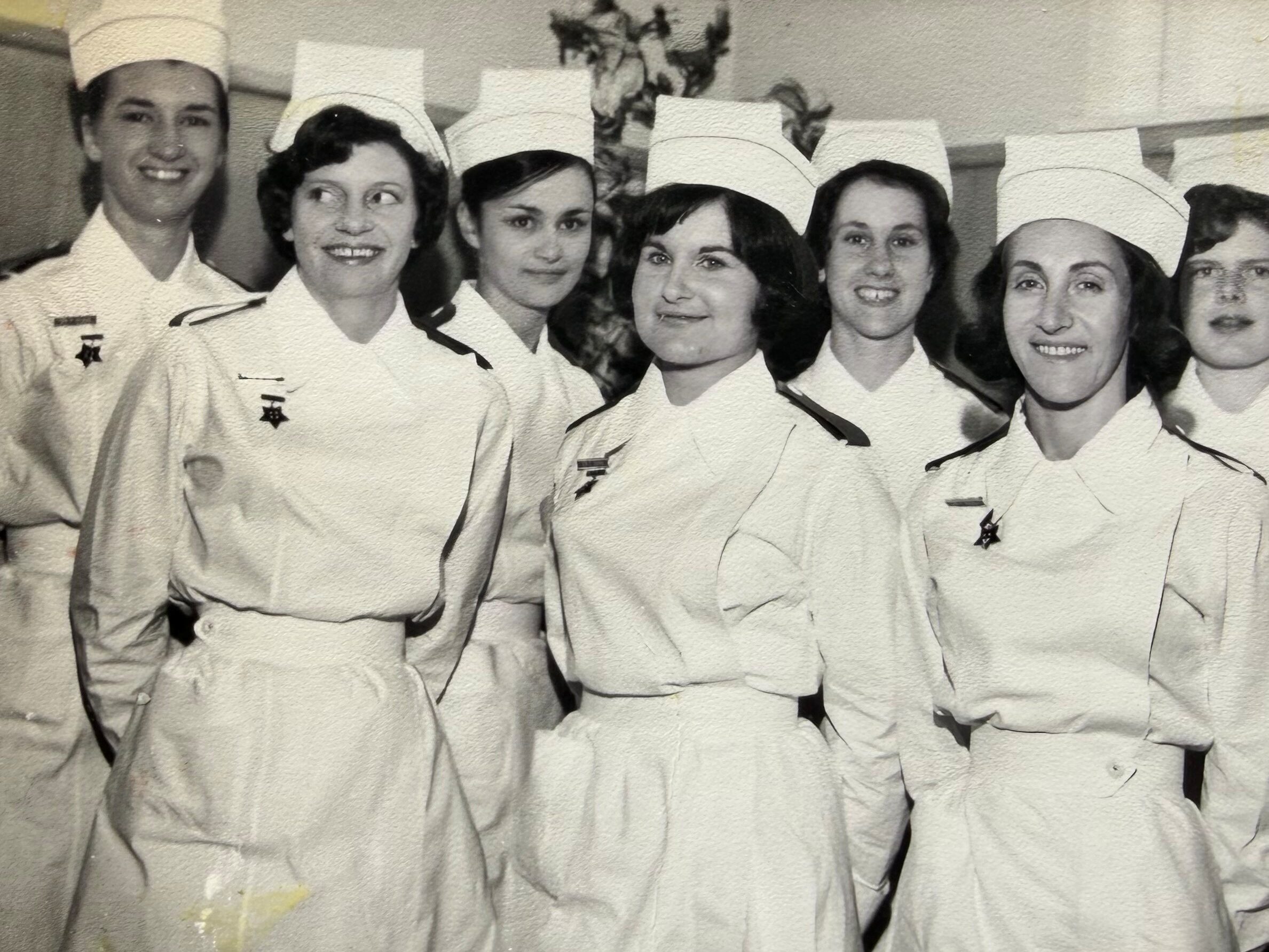 Ros Corban, third from left in the back row, with her fellow graduates in the mid-60s.